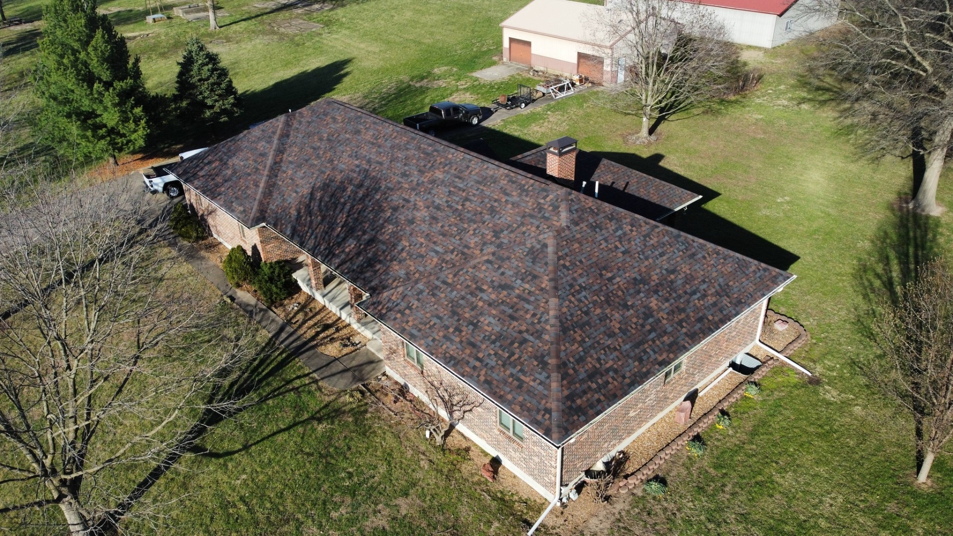 Residential roof replacement on brick ranch home