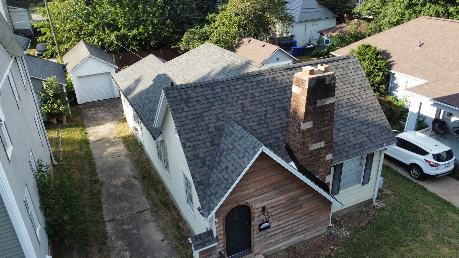 Residential roof replacement — angled drone view